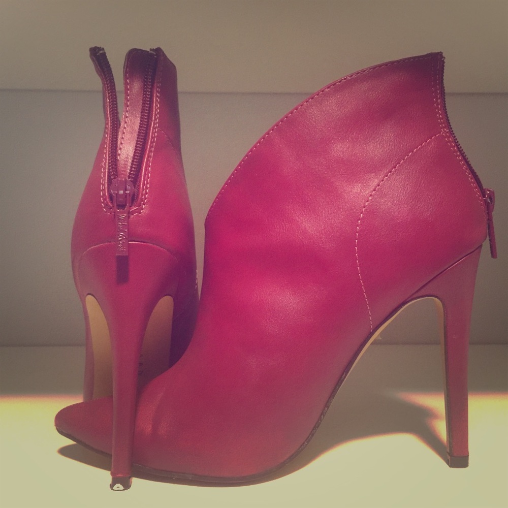 Pink leather booties in size 8.